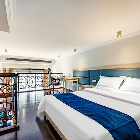 Pangdai International Aparthotel Modiesha Metro Branch Гуанчжоу Экстерьер фото